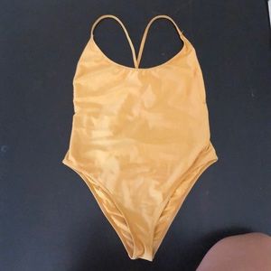 Bathing suit size M but fits more like a small